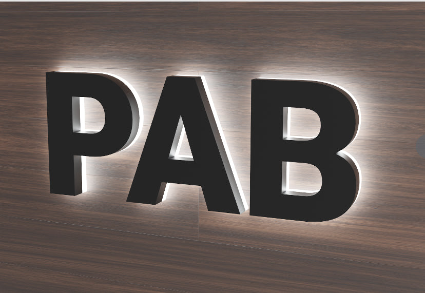 Reversed Channel Letters with Profiled Acrylic Backs